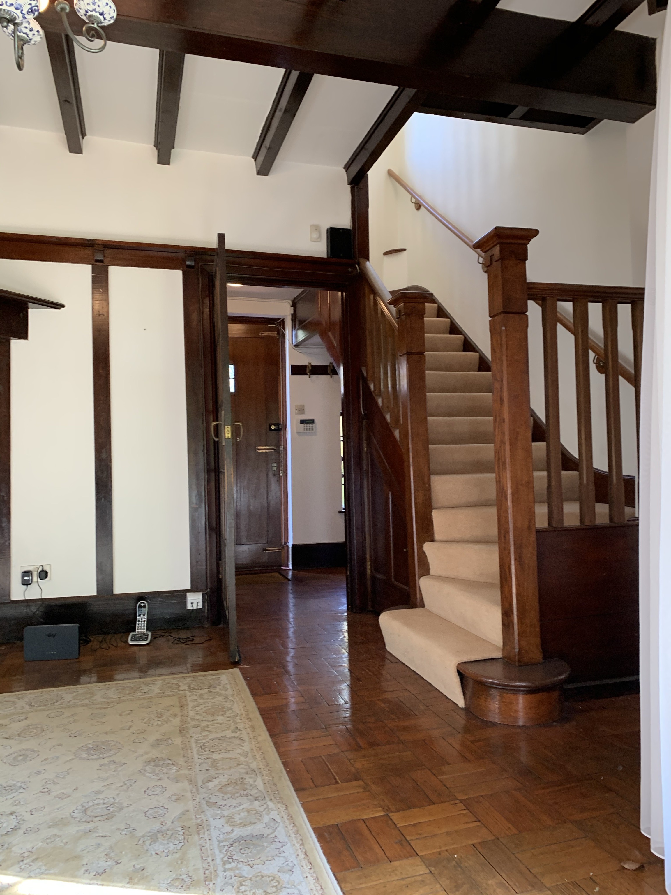 Before - Make this a modern hallway with black + marble accents