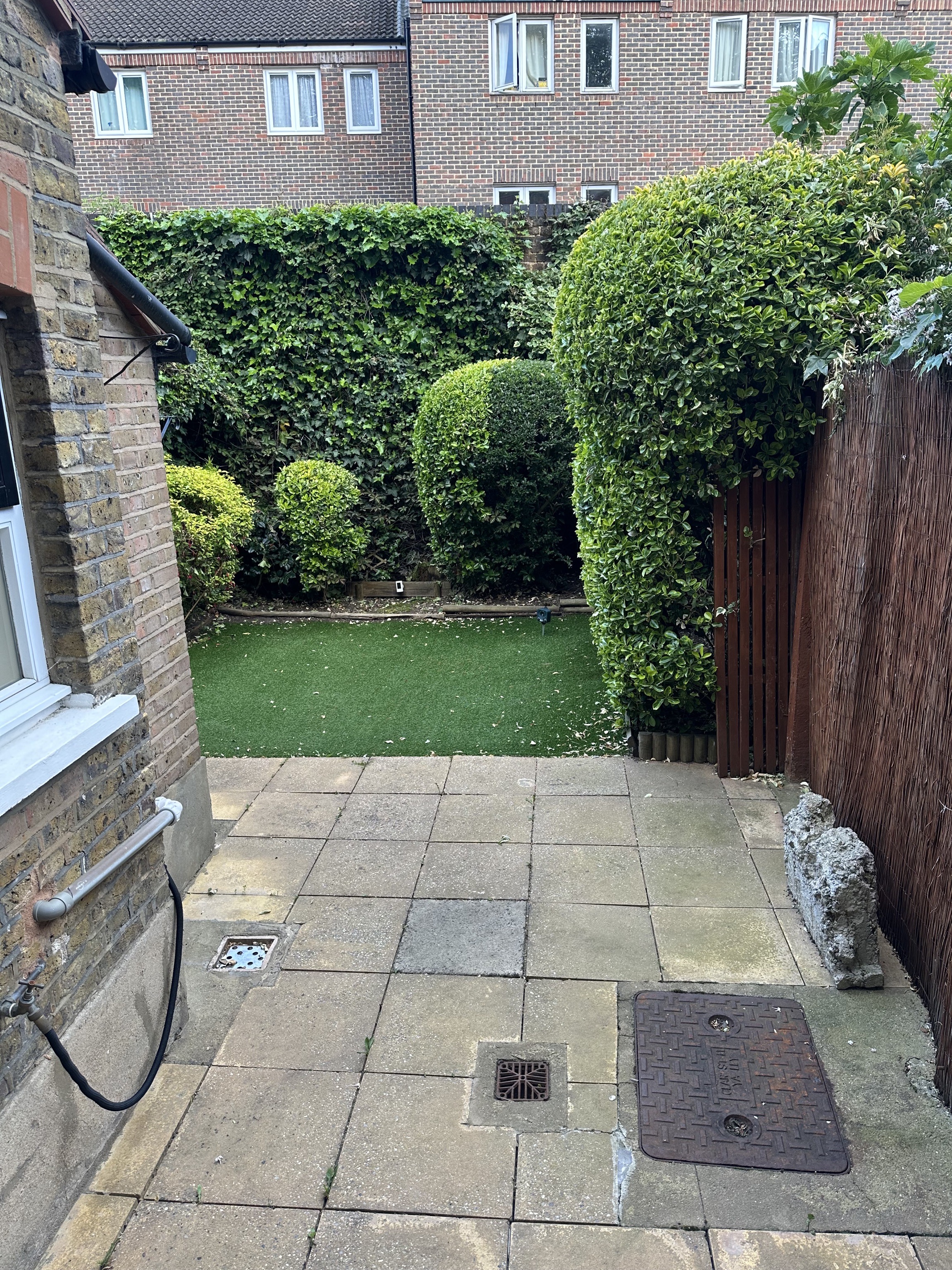 Before - Replace old patio tiles with large modern slabs